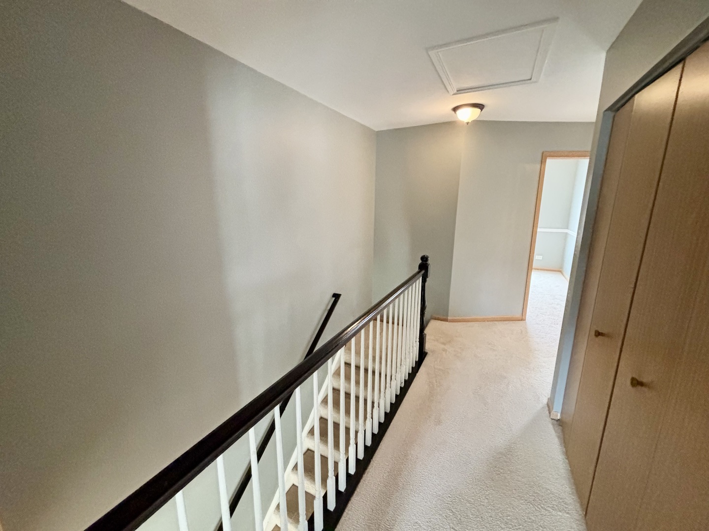 906 Clover Lane, Unit 906 Pingree Grove, IL 60140 - Photo 25 of 37 a view of hallway with wooden floor
