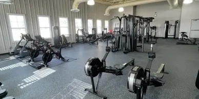 906 Clover Lane, Unit 906 Pingree Grove, IL 60140 - Photo 32 of 37 a view of a room with gym equipment