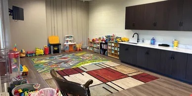 906 Clover Lane, Unit 906 Pingree Grove, IL 60140 - Photo 36 of 37 a workspace with furniture and a rug