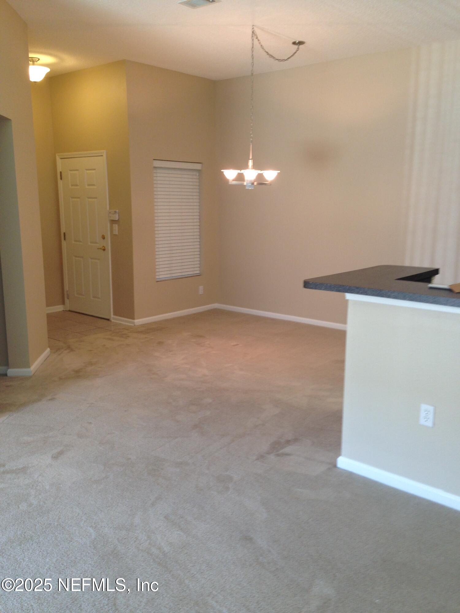 9625 Amarante Way, Unit 6 Jacksonville, FL 32257 - Photo 2 of 17 a view of an empty room