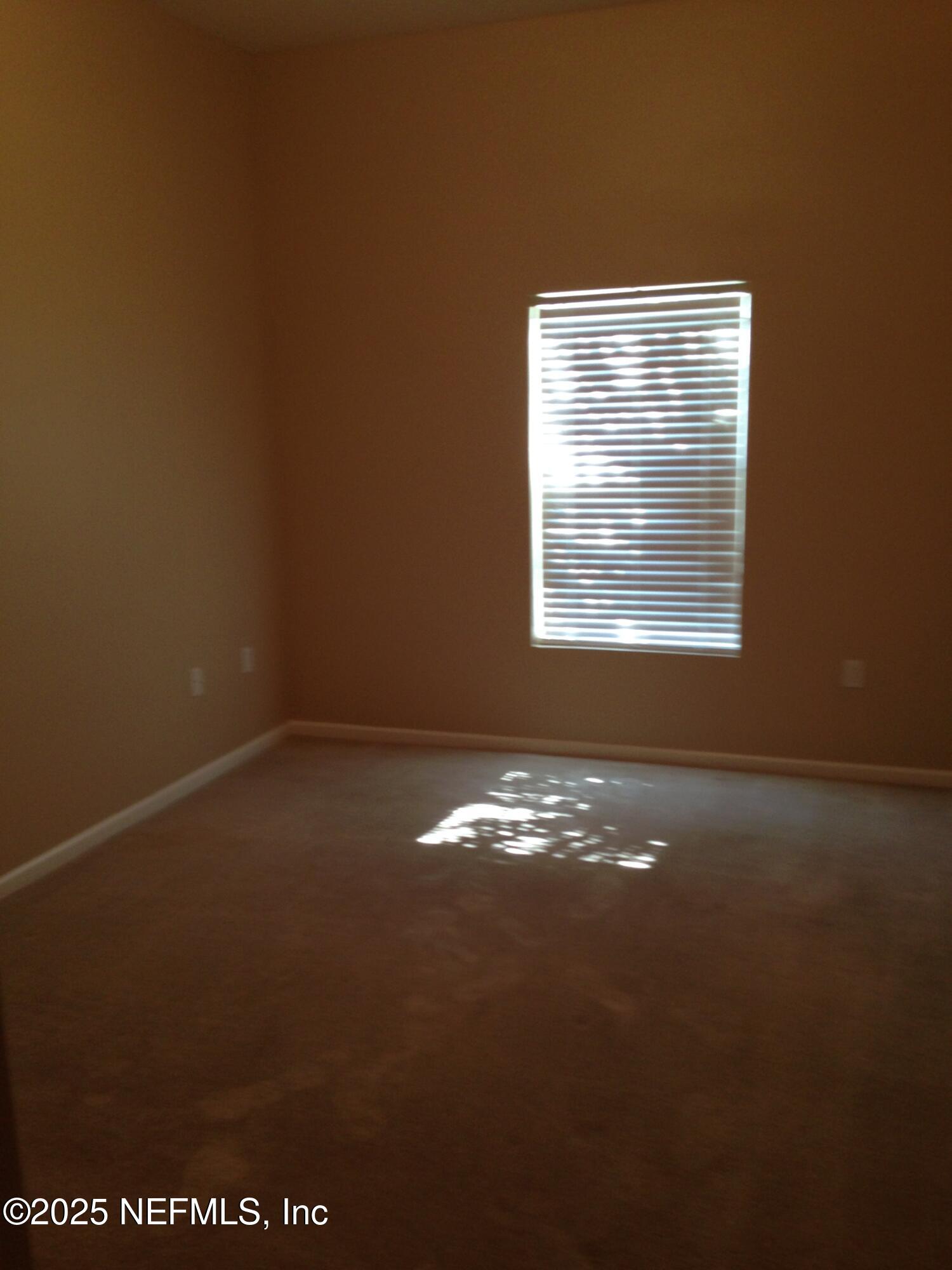 9625 Amarante Way, Unit 6 Jacksonville, FL 32257 - Photo 3 of 17 a view of room and window