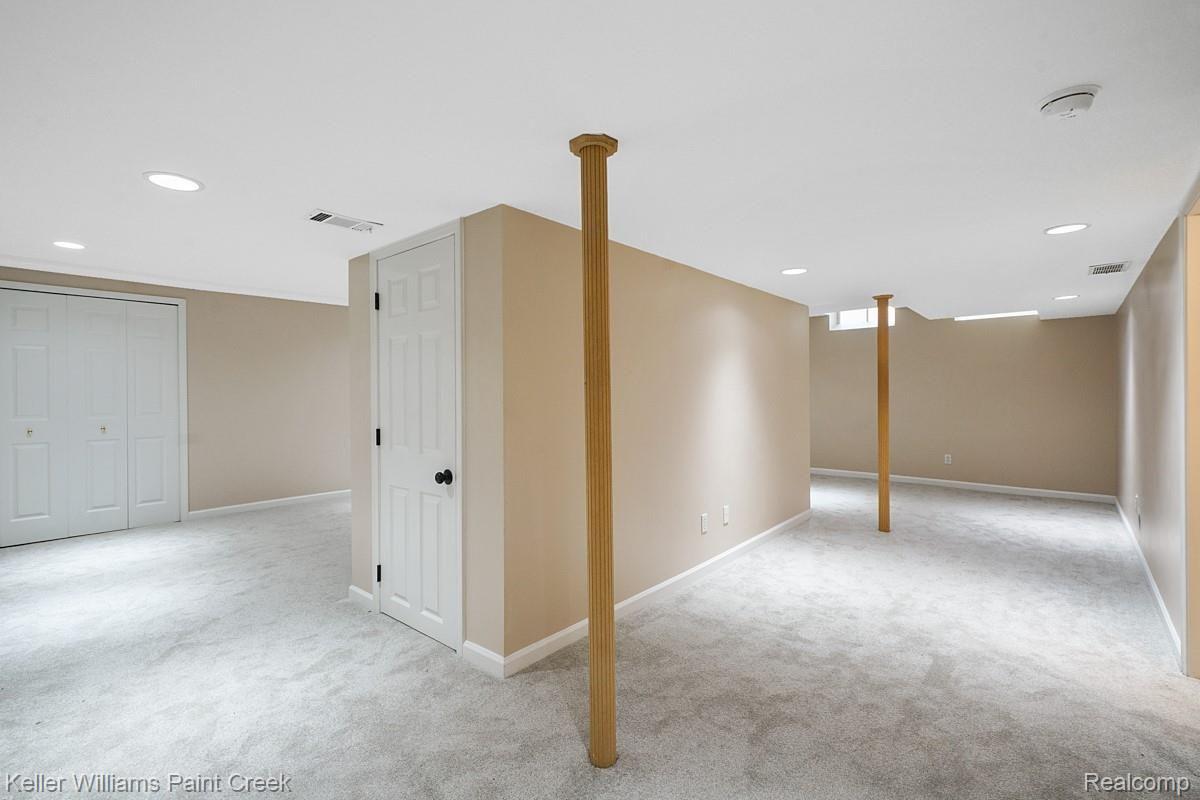 2641 Long Meadow Lane Rochester, MI 48307 - Photo 32 of 38 Finished lower level offers a ton of extra living space.