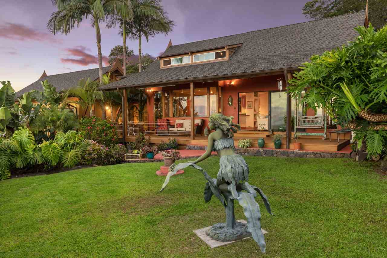 2623 Lower Kula Road Kula, HI 96790 - Photo 23 of 29 a view of swimming pool with a table and chairs