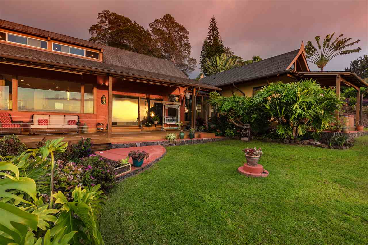 2623 Lower Kula Road Kula, HI 96790 - Photo 28 of 29 a view of a backyard with a table and chairs