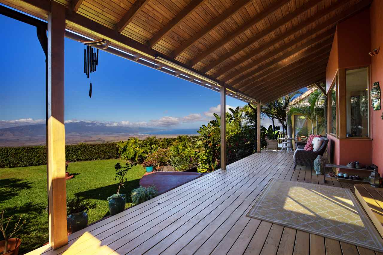 2623 Lower Kula Road Kula, HI 96790 - Photo 7 of 29 a view of a balcony with wooden floor