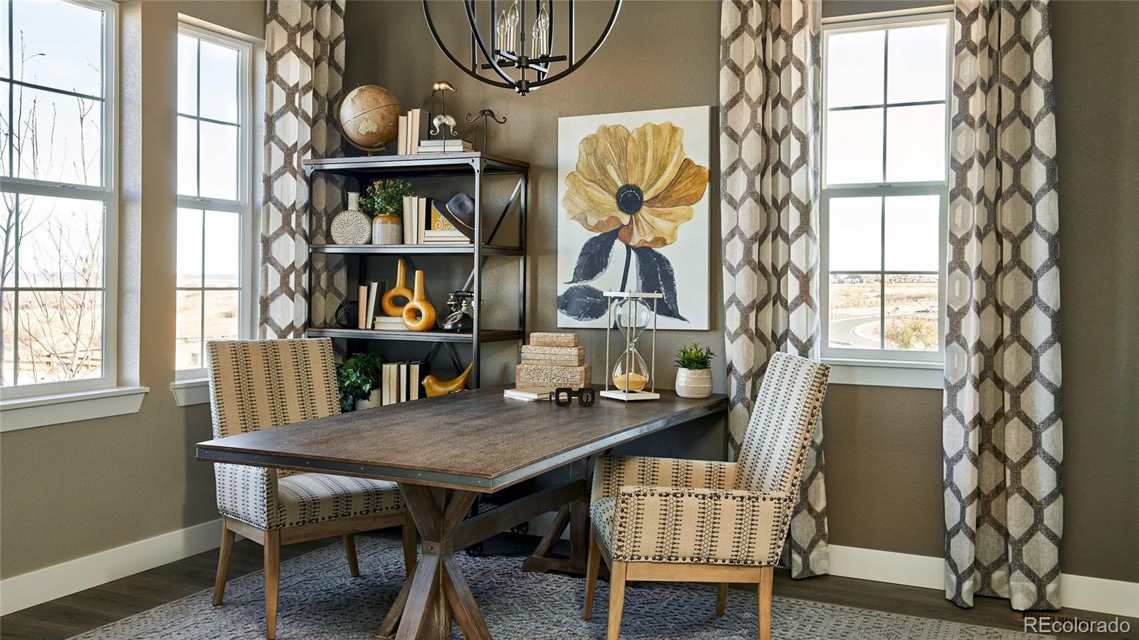 3867 Freestone Point Castle Rock, CO 80108 - Photo 17 of 38 a dining room with furniture and window