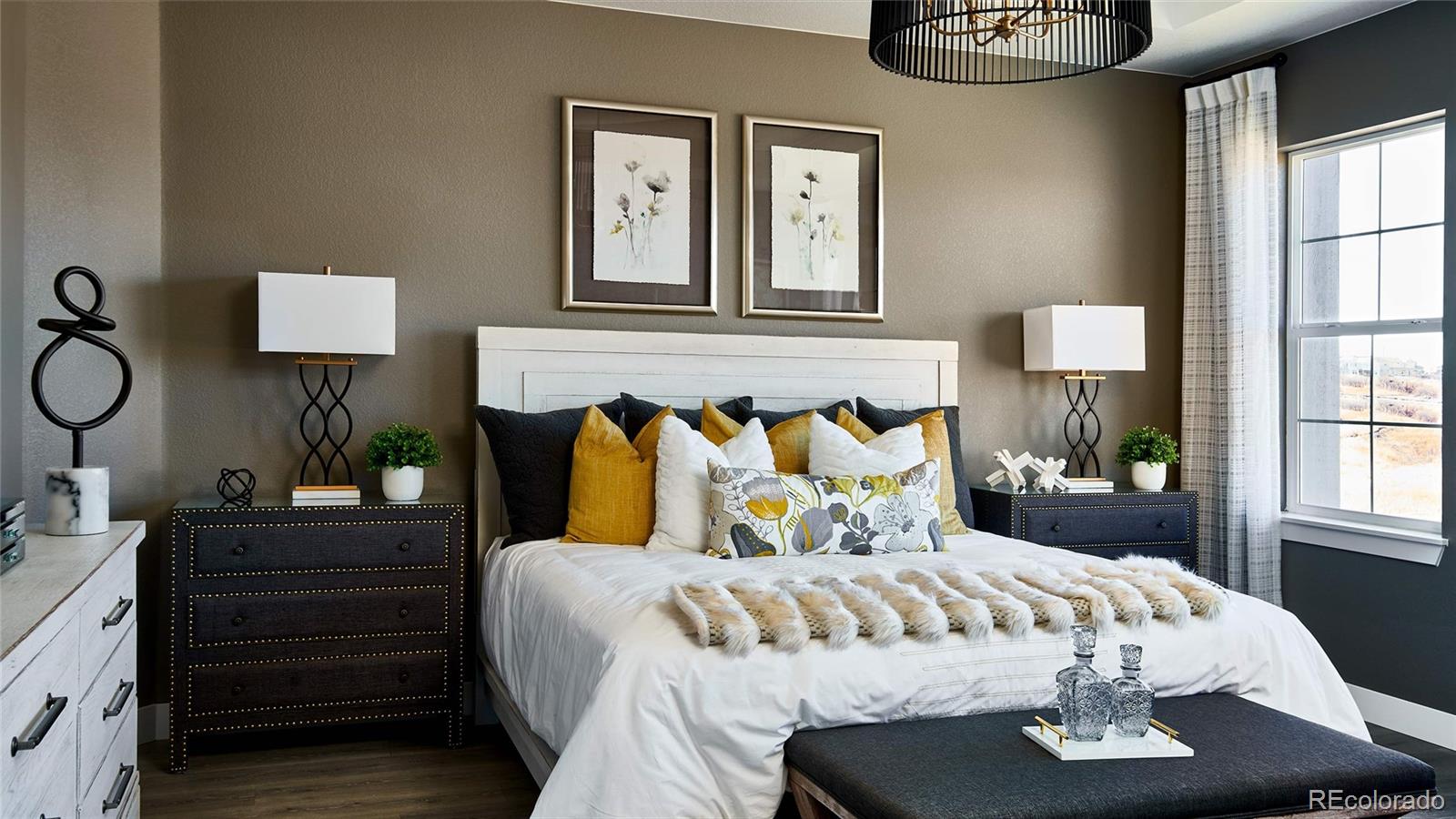 3867 Freestone Point Castle Rock, CO 80108 - Photo 18 of 38 a bedroom with a bed and window