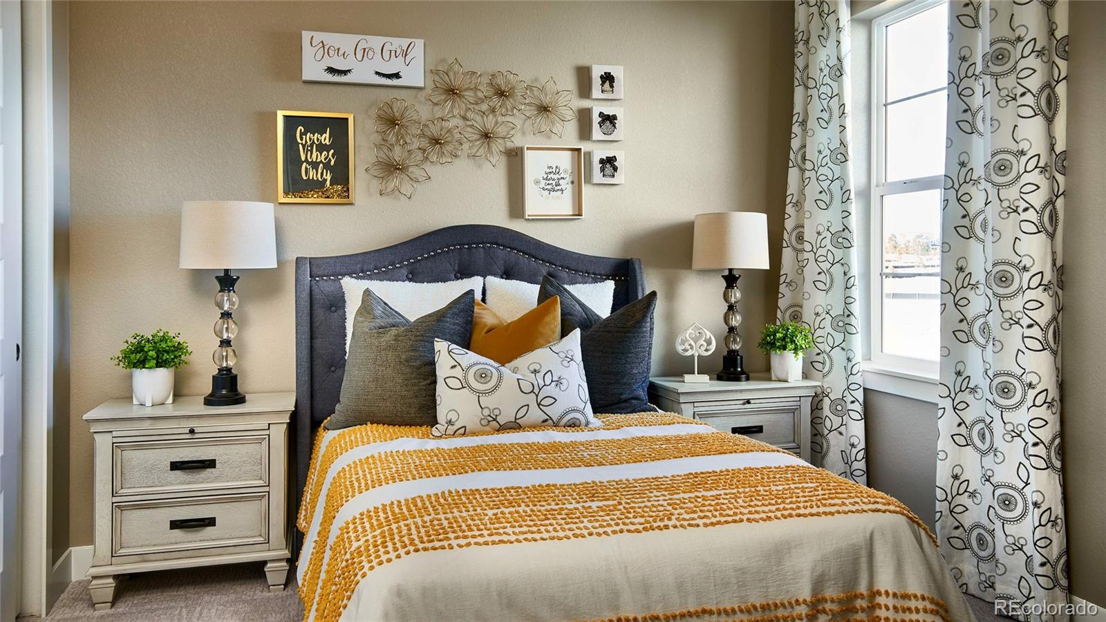 3867 Freestone Point Castle Rock, CO 80108 - Photo 7 of 38 a bedroom with a bed and a window