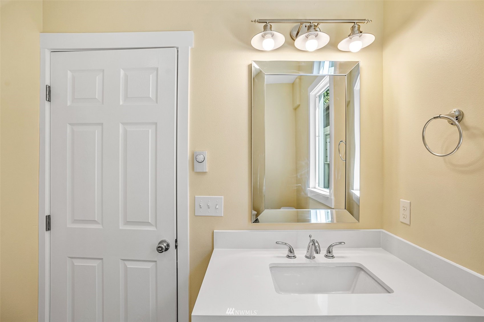 3113 Oakes Avenue Everett, WA 98201 - Photo 15 of 38 a bathroom with a sink vanity and a mirror