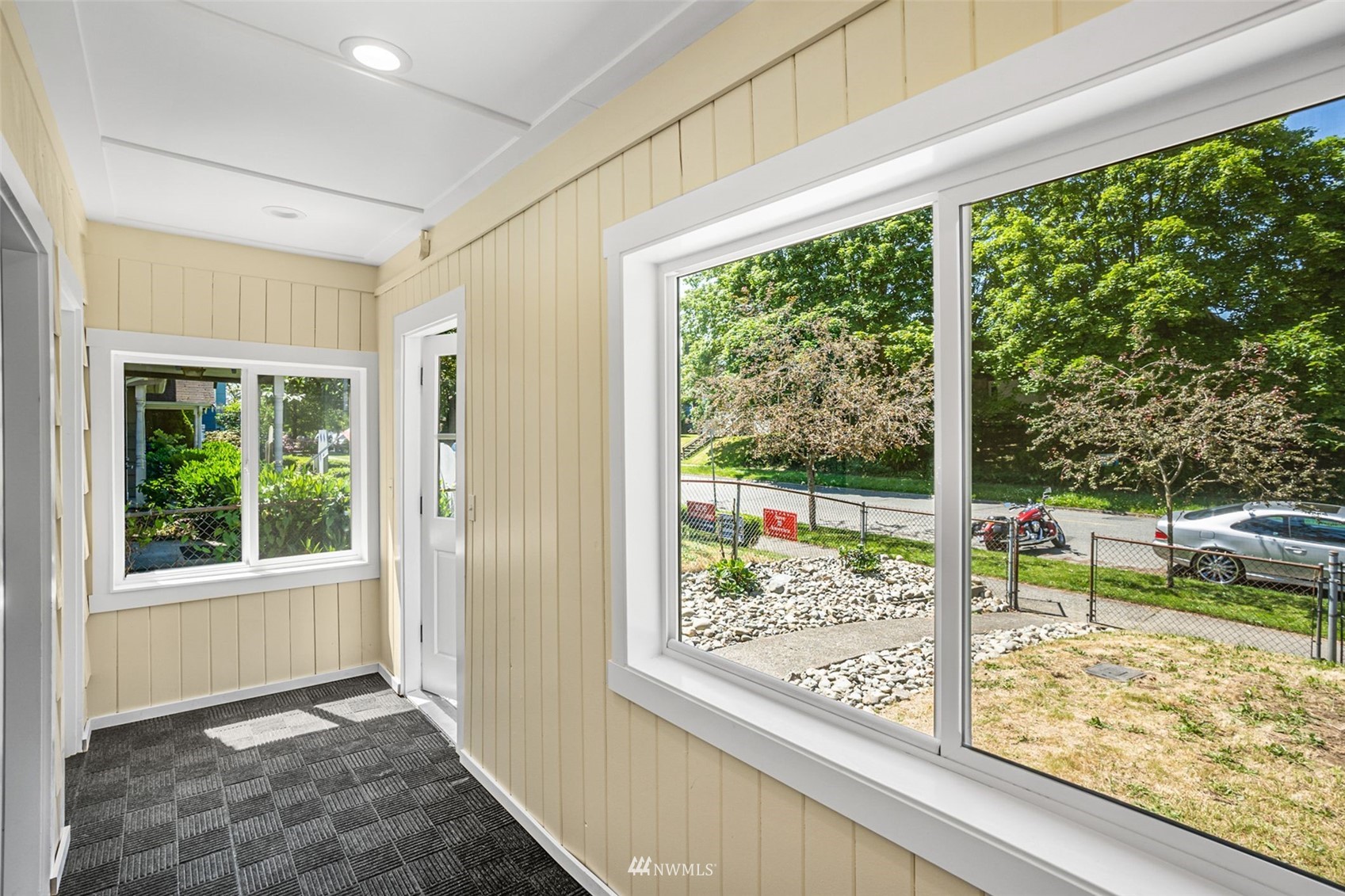 3113 Oakes Avenue Everett, WA 98201 - Photo 3 of 38 a view of backyard with large trees and plants