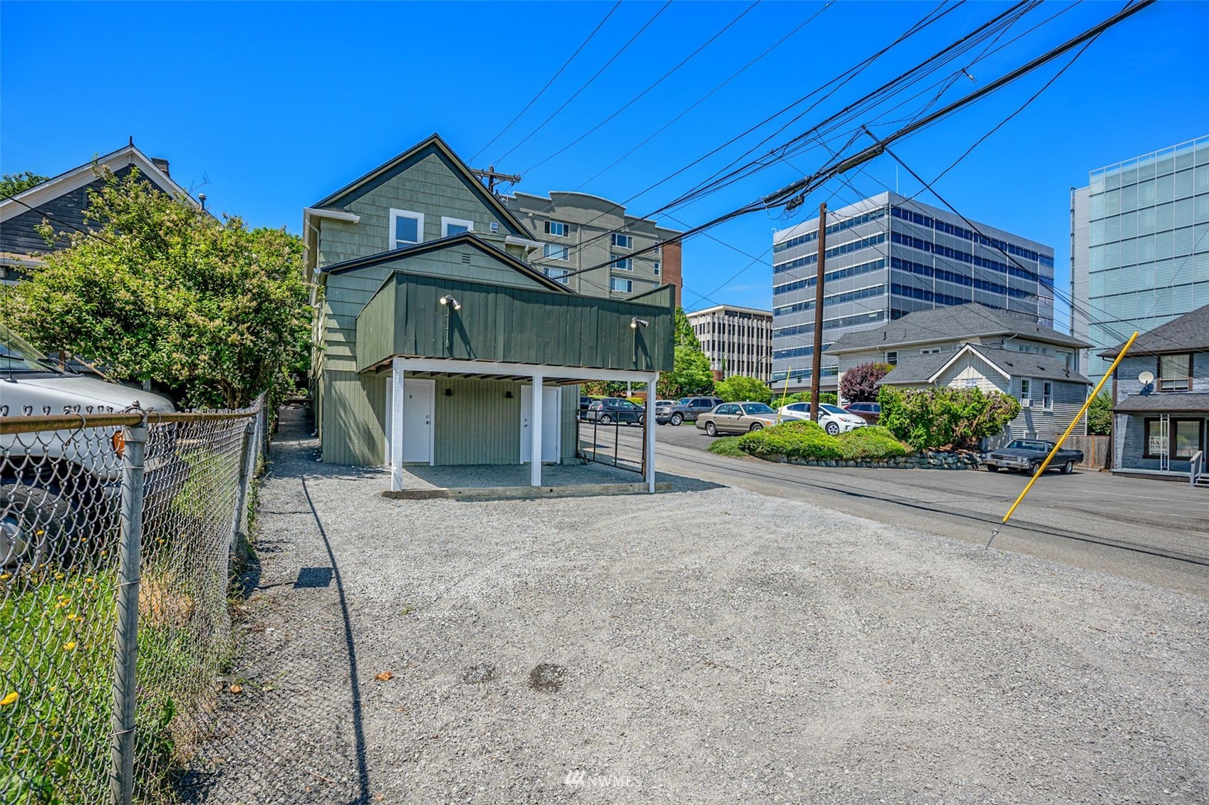 3113 Oakes Avenue Everett, WA 98201 - Photo 37 of 38 a view of a house with a yard and potted plants