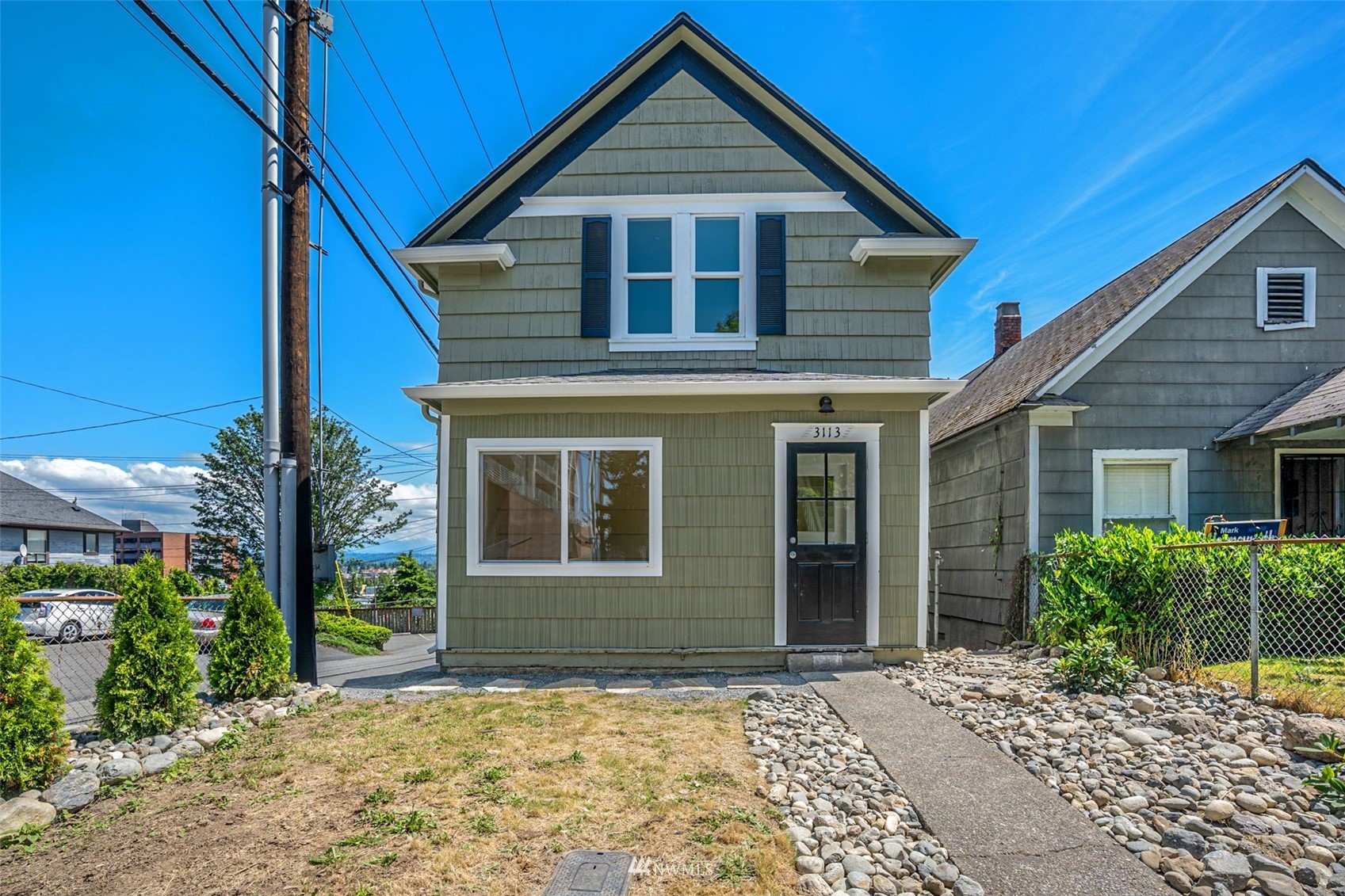 3113 Oakes Avenue Everett, WA 98201 - Photo 38 of 38 a front view of a house with a yard