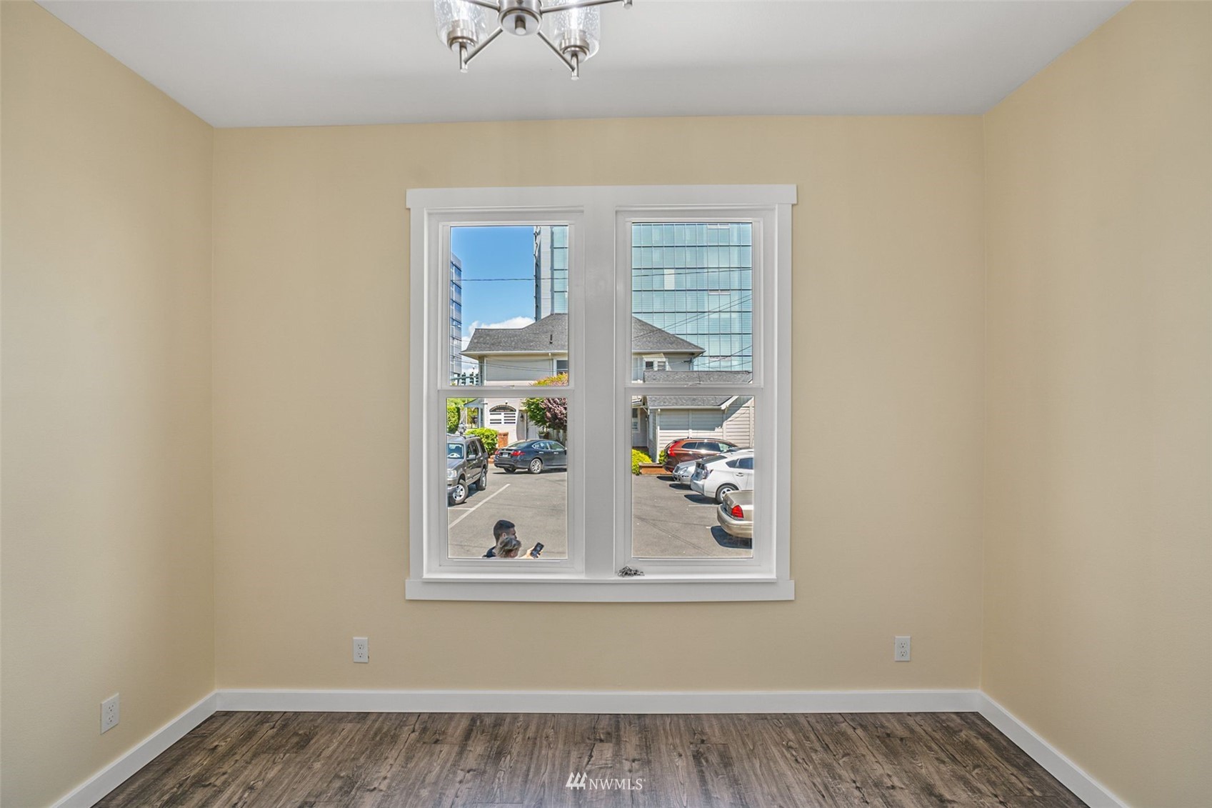 3113 Oakes Avenue Everett, WA 98201 - Photo 9 of 38 a view of a small space with wooden floor and a window
