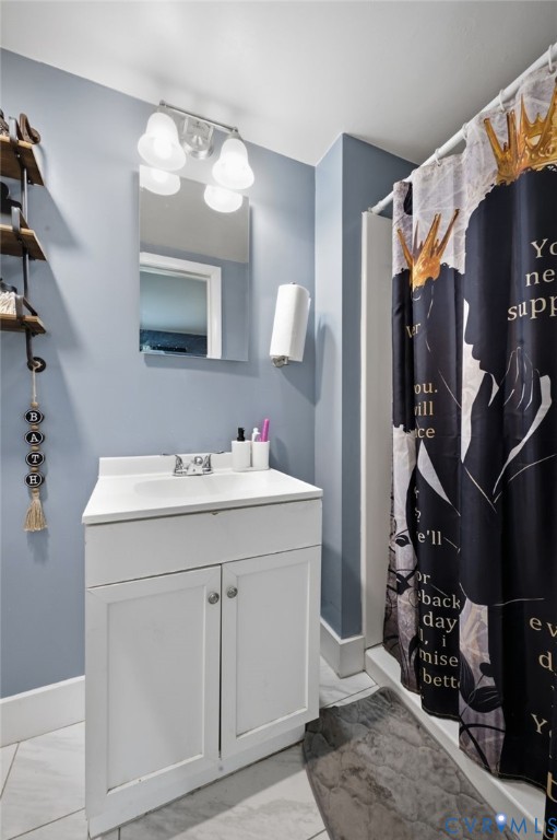 4021 Beulah Road Richmond, VA 23237 - Photo 13 of 27 Bathroom featuring a single vanity with storage, a