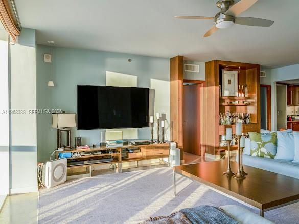 450 Alton Road, Unit 1202 Miami Beach, FL 33139 - Photo 6 of 68 a living room with stainless steel appliances kitchen island granite countertop a couch and a view of living room