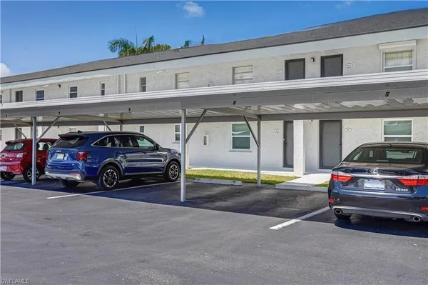 a car parked in front of a building