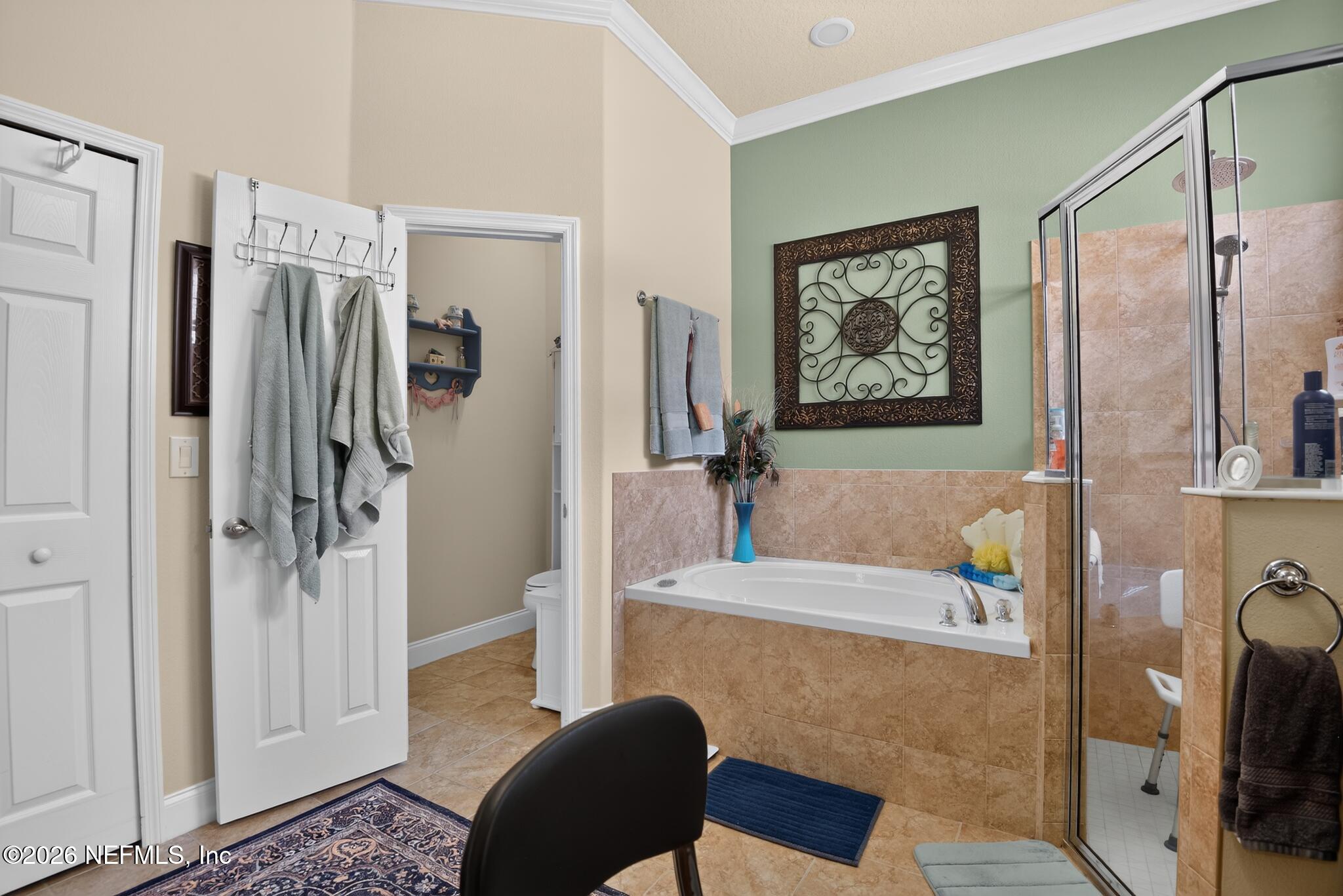 110 Vía Roma Ormond Beach, FL 32174 - Photo 23 of 43 a bathroom with a tub sink and a shower