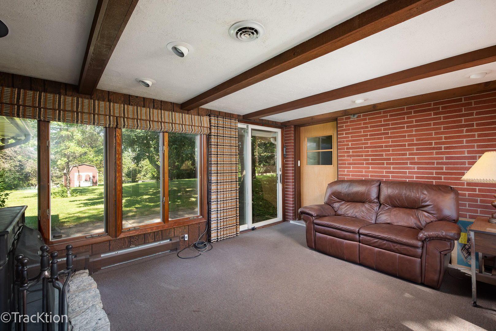 454 Andrus Road Darien, IL 60561 - Photo 14 of 20 a outdoor living space with furniture and large windows