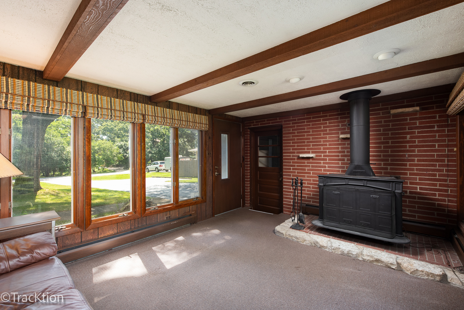 454 Andrus Road Darien, IL 60561 - Photo 15 of 20 a view of an empty room with a fireplace and a window