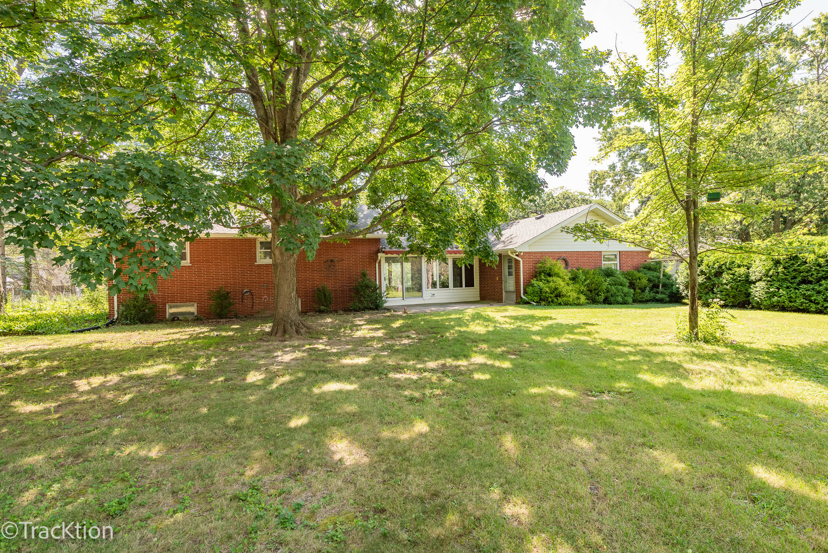 454 Andrus Road Darien, IL 60561 - Photo 19 of 20 a front view of a house with a yard and tree s