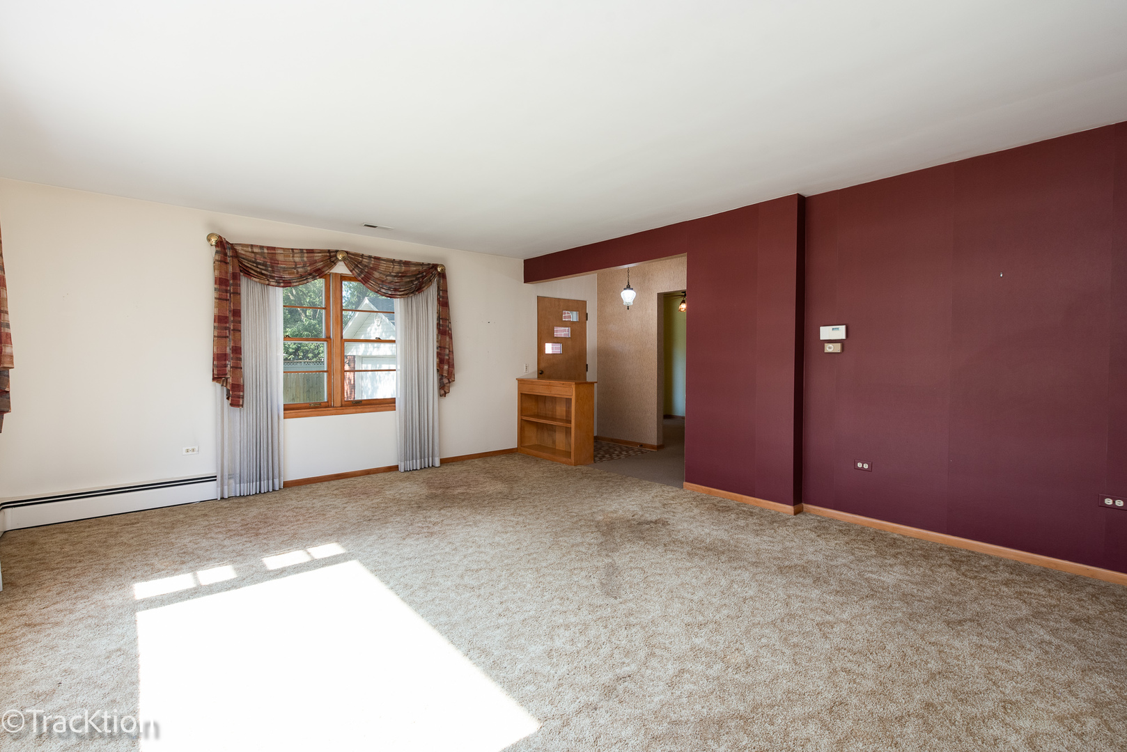 454 Andrus Road Darien, IL 60561 - Photo 2 of 20 an empty room with windows