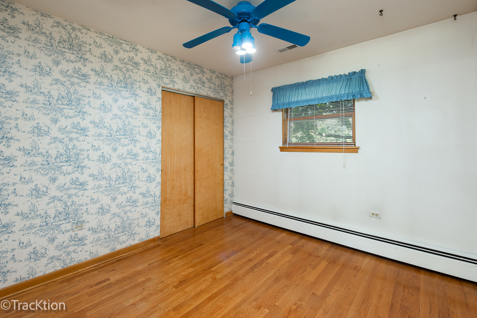 454 Andrus Road Darien, IL 60561 - Photo 10 of 20 an empty room with closet and a chandelier fan