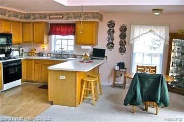 4145 Port Austin Road Caseville, MI 48725 - Photo 4 of 16 4145PtAustinKitchDining.jpg