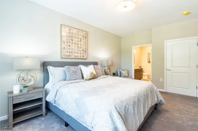 a bedroom with bed and window