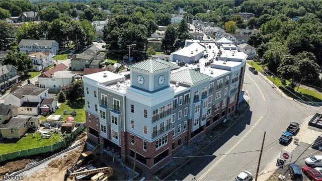 an aerial view of a house with a garden