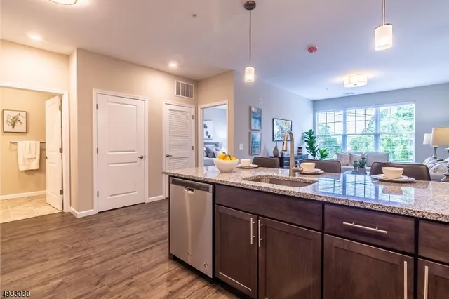 a kitchen with lots of counter space and a sink