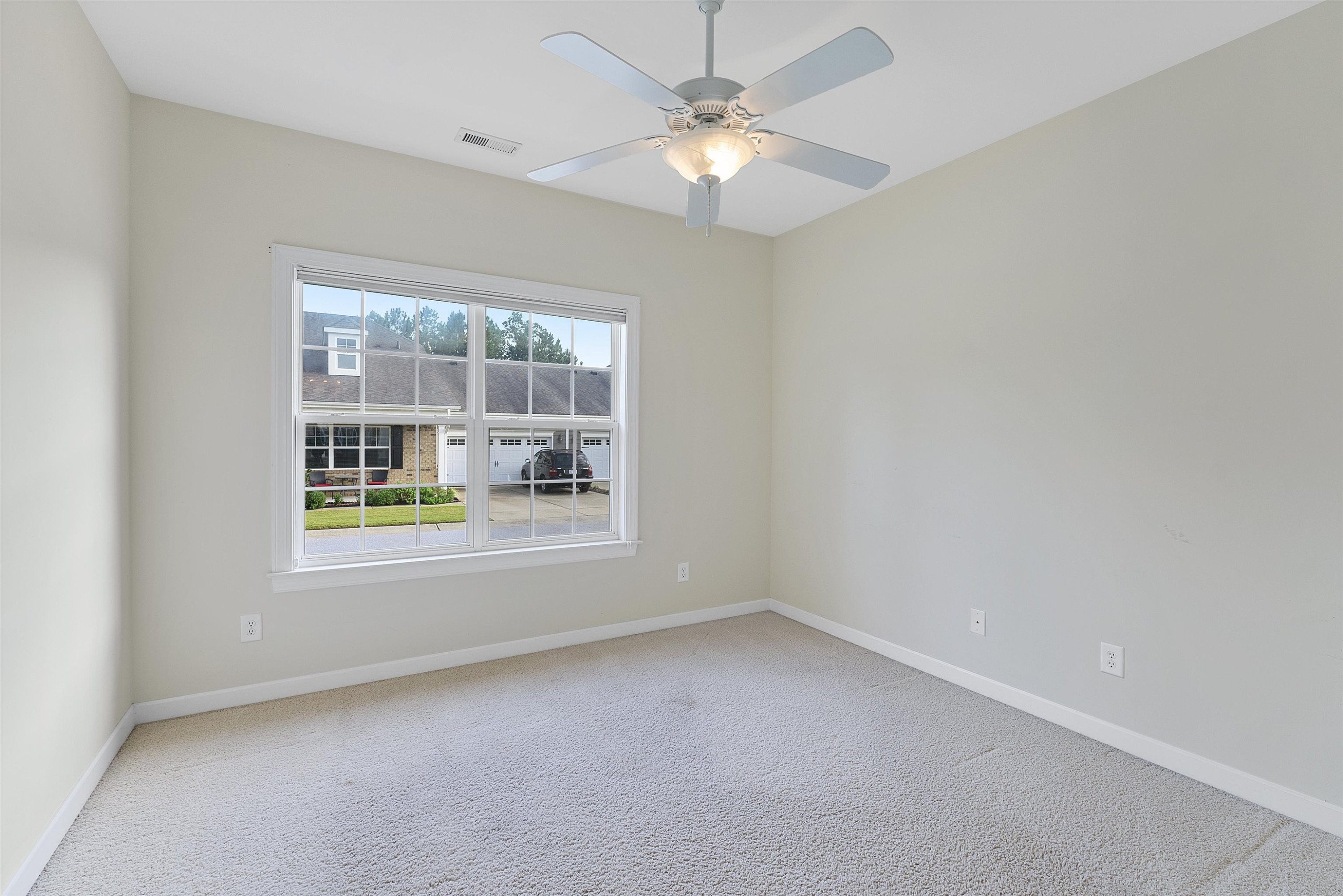 4723 Split Branch Court Raleigh, NC 27604 - Photo 25 of 30 an empty room with a window