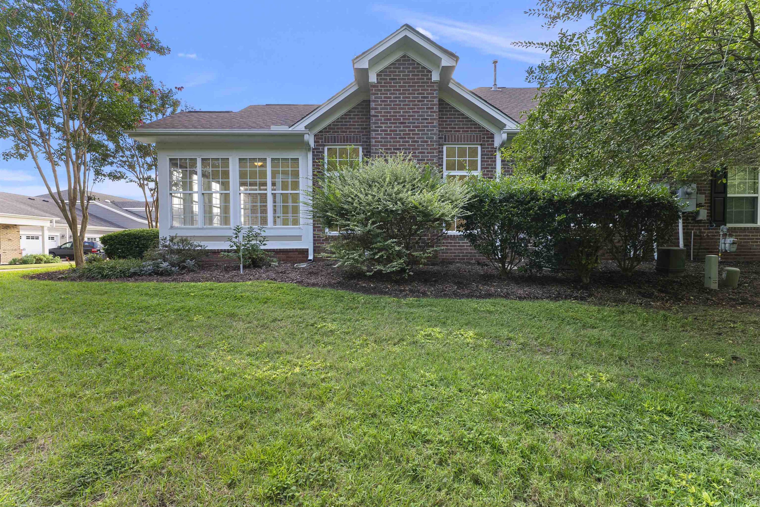 4723 Split Branch Court Raleigh, NC 27604 - Photo 3 of 30 a front view of a house with a garden