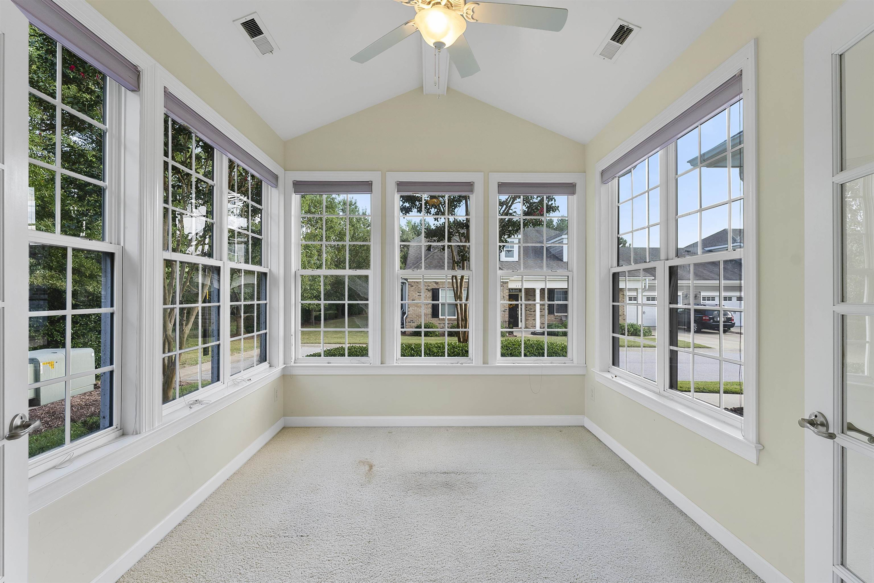 4723 Split Branch Court Raleigh, NC 27604 - Photo 7 of 30 a view of an empty room with a window and balcony view