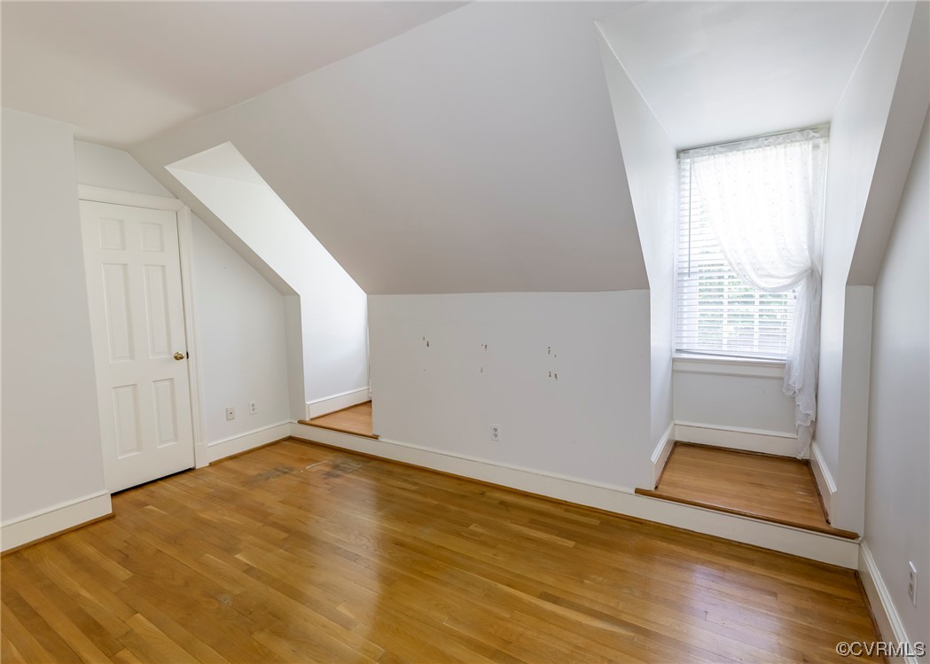 13329 Starcross Road Midlothian, VA 23113 - Photo 30 of 47 an empty room with wooden floor and windows
