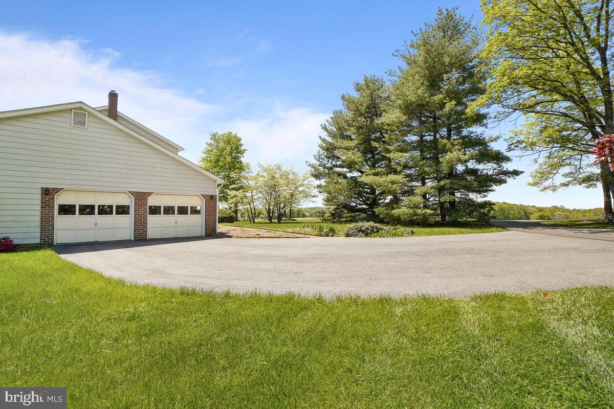 7921 Chestnut Grove Road Frederick, MD 21701 - Photo 4 of 34 And a large, 2-car garage