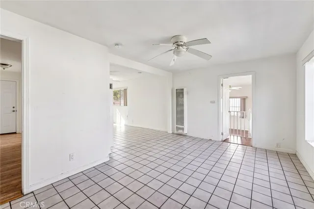 a view of an empty room and window