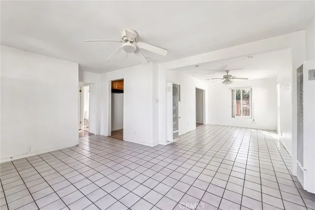 a view of an empty room and window