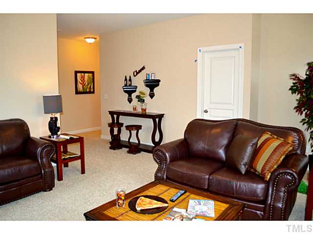 804 Chapanoke Road Raleigh, NC 27603 - Photo 22 of 25 a living room with furniture