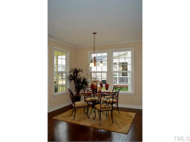 804 Chapanoke Road Raleigh, NC 27603 - Photo 10 of 25 a view of a dining room with furniture and window