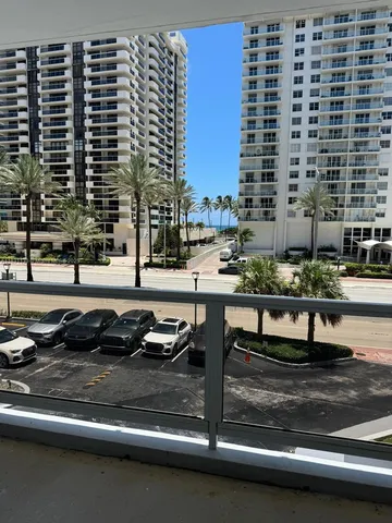 a view of a street with sitting area