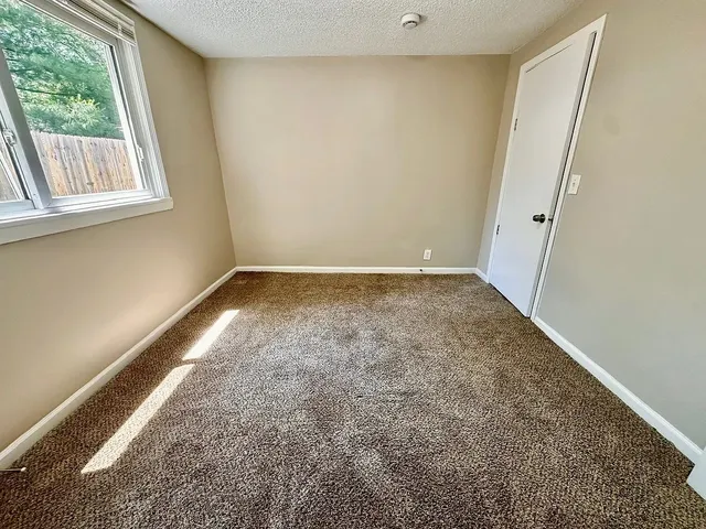 an empty room with a window