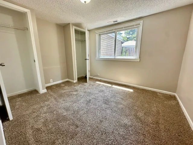 an empty room with windows