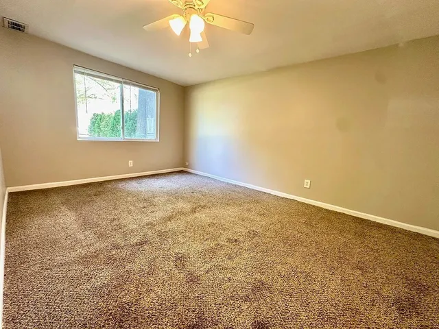 an empty room with windows