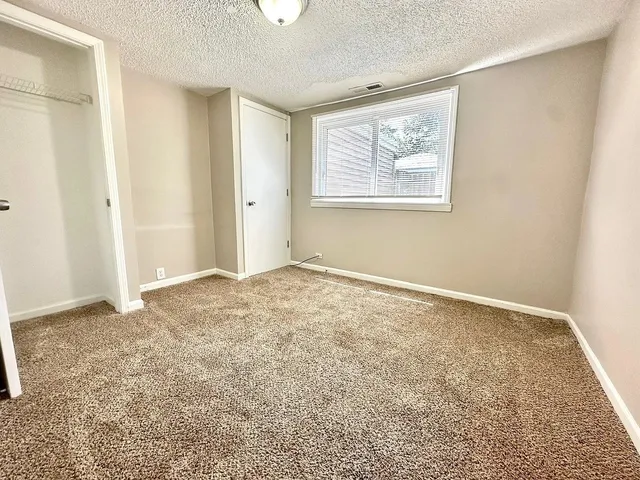 an empty room with window