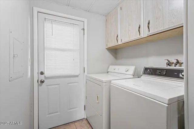 a view of a livingroom with furniture and window
