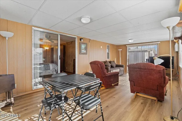 a living room with furniture and a window