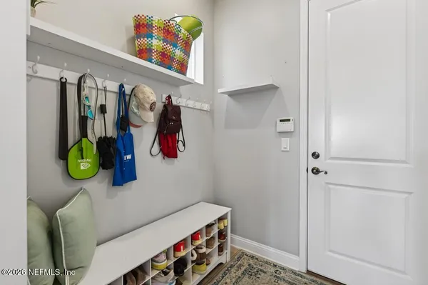 a bathroom with a sink double vanity and a mirror