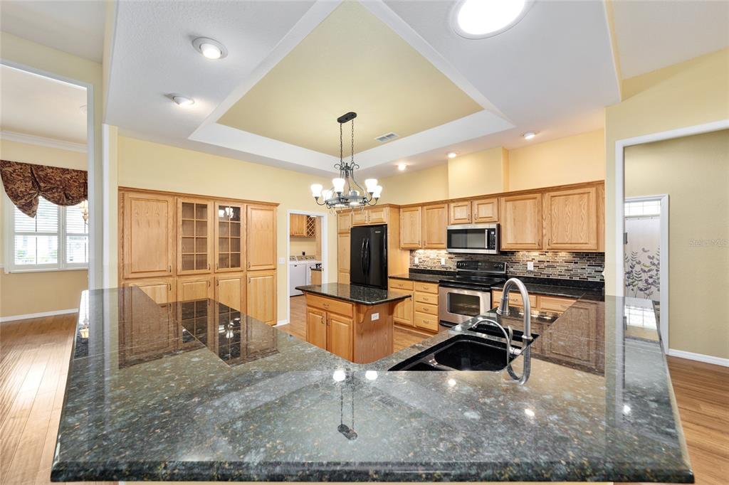 11017 Southwest 71st Terrace Road Ocala, FL 34476 - Photo 16 of 49 a room with gym equipment and view of living room