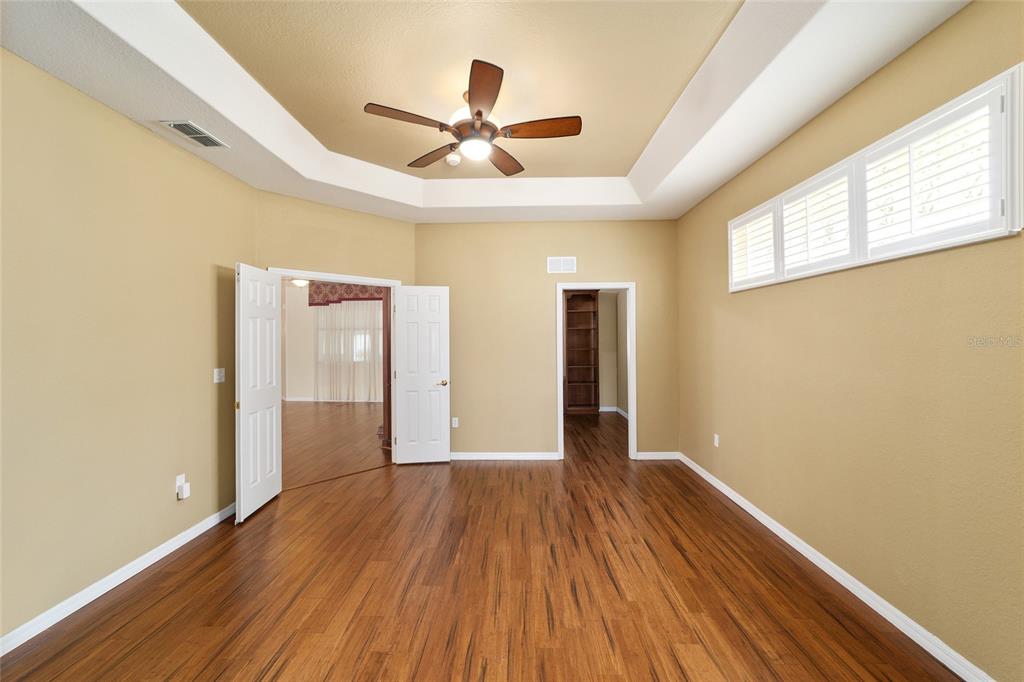 11017 Southwest 71st Terrace Road Ocala, FL 34476 - Photo 24 of 49 a view of livingroom with hardwood floor and window