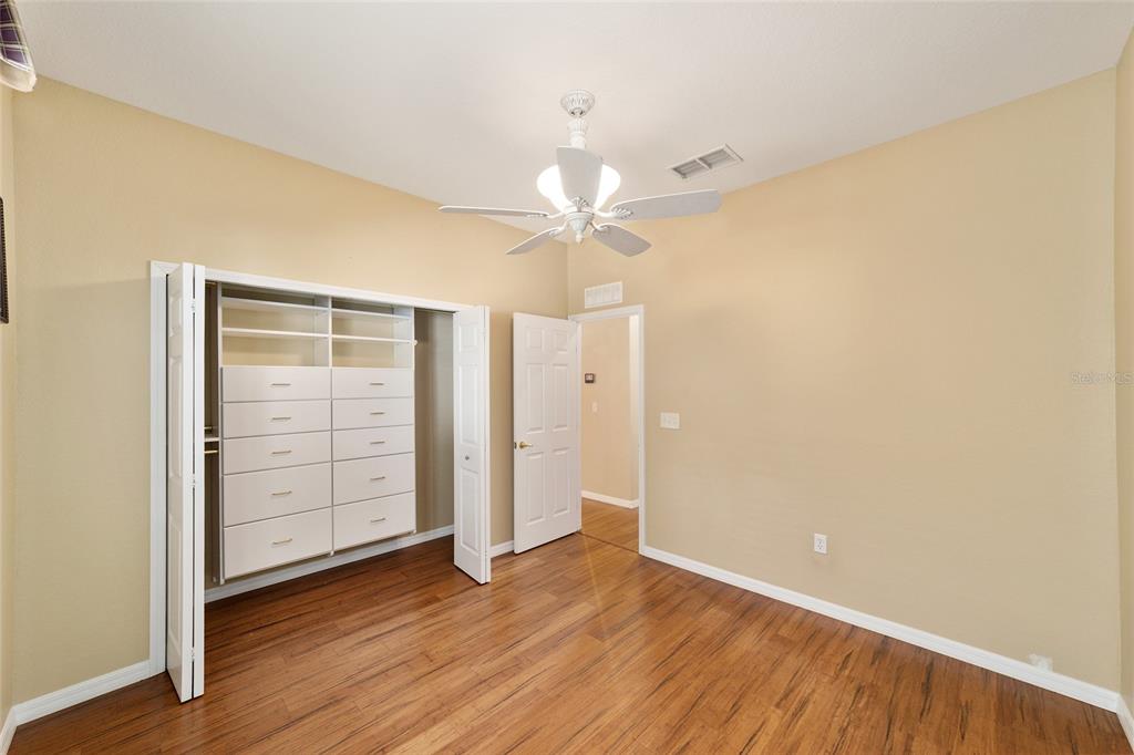 11017 Southwest 71st Terrace Road Ocala, FL 34476 - Photo 35 of 49 wooden floor in an empty room